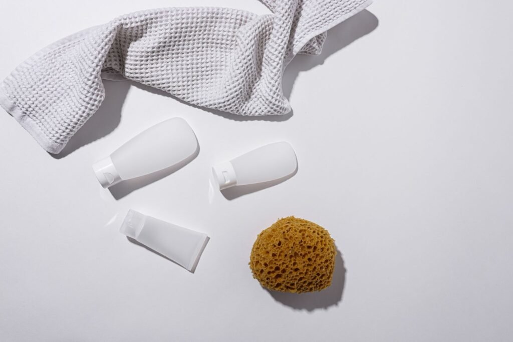 A small, minimal set of skincare essentials on a clean light surface