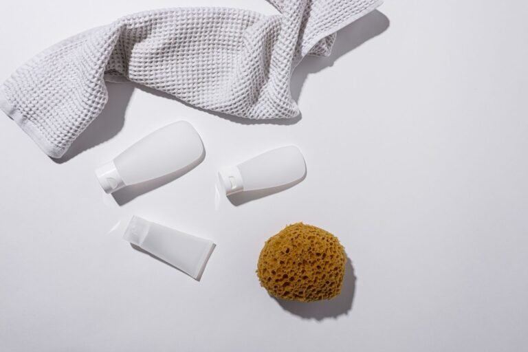A small, minimal set of skincare essentials on a clean light surface