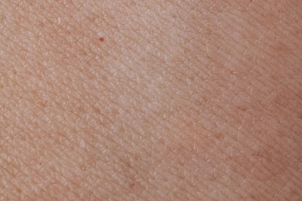 Macro close-up of natural skin texture in soft natural light