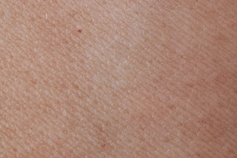 Macro close-up of natural skin texture in soft natural light