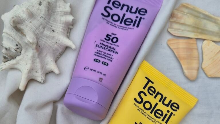 A bottle and a tube of sunscreen side by side