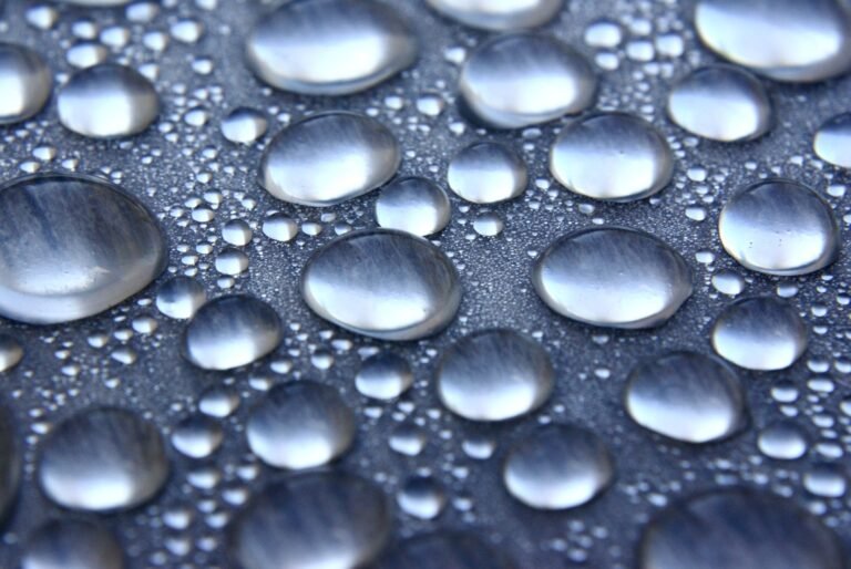 Close-up of water droplets on a smooth surface