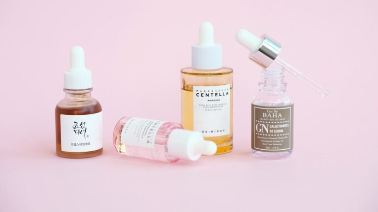 Minimal arrangement of skincare serum dropper bottles